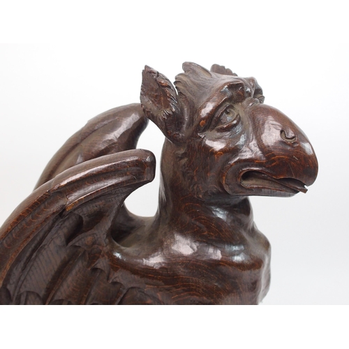 330 - Two Victorian oak carved griffins