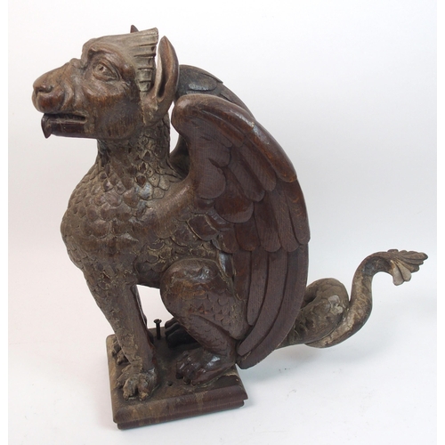 330 - Two Victorian oak carved griffins