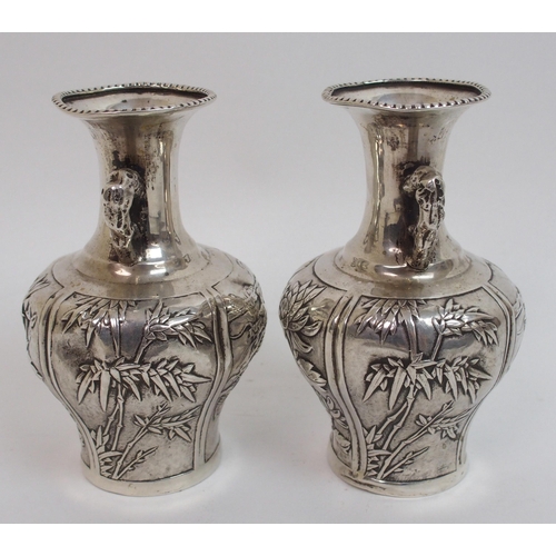 40 - A pair of Chinese silver two-handled baluster vases