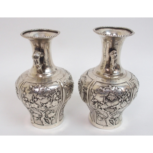 40 - A pair of Chinese silver two-handled baluster vases