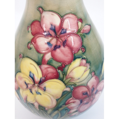 482 - A Moorcroft pottery freesia vase