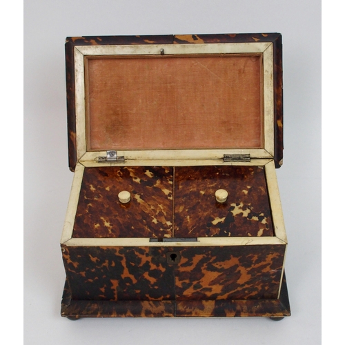 487 - A Georgian tortoiseshell double tea caddy of sarcophagus form