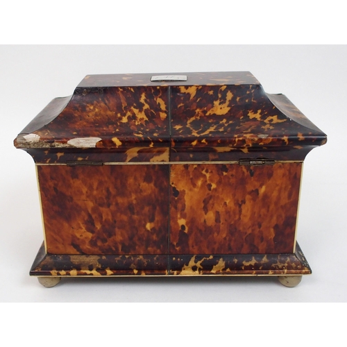 487 - A Georgian tortoiseshell double tea caddy of sarcophagus form