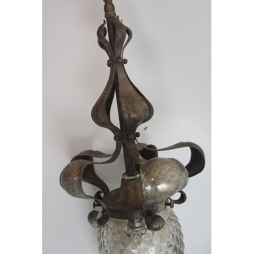 498 - An Arts and Crafts glass and wrought iron hall lantern