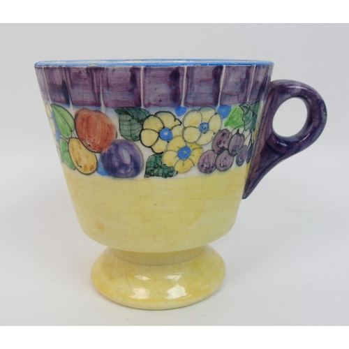 514 - Mary L Fairgrieve (1875-1969) A pottery mug