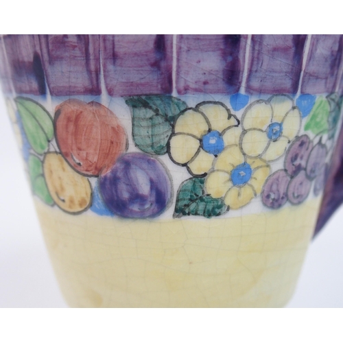 514 - Mary L Fairgrieve (1875-1969) A pottery mug