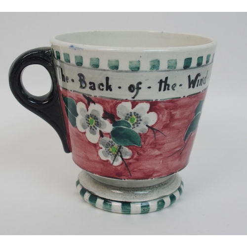 515 - A Mak Merry pottery mug