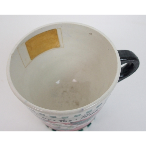 515 - A Mak Merry pottery mug