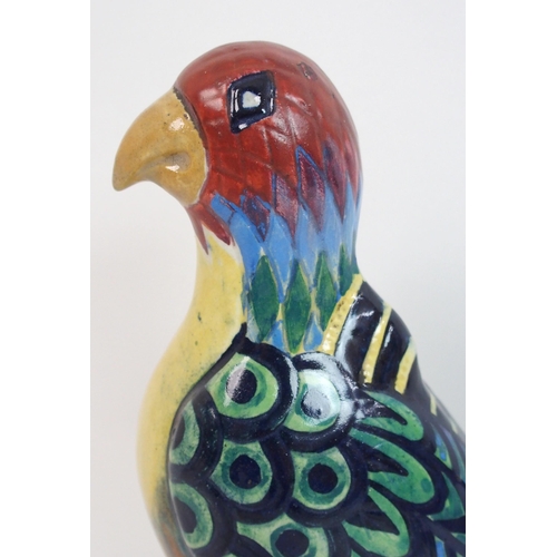 523 - Elizabeth Mary Watt (1886-1954) A pottery figure of a parrot