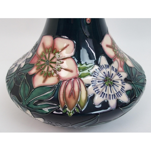 526 - A Moorcroft Passion flower pattern vase