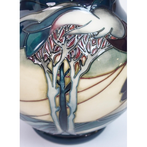 528 - A Moorcroft Vale de Luna pattern vase