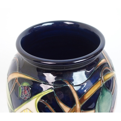 531 - A Moorcroft Queens Choice pattern vase