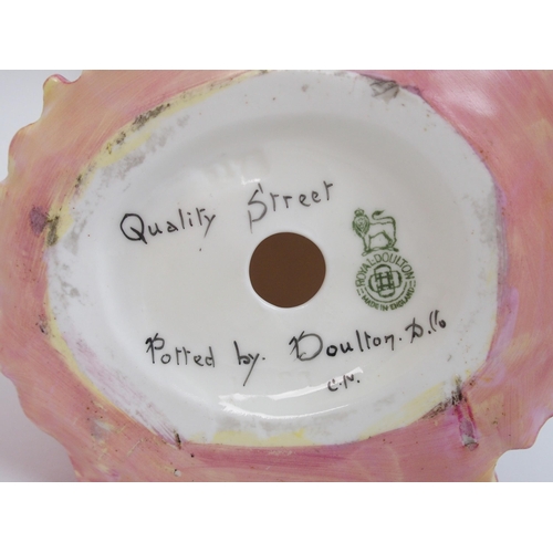 551 - A Royal Doulton figure Quality Street