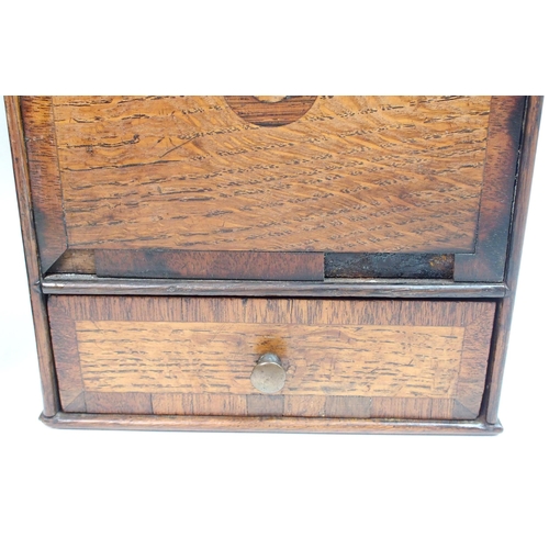 556 - A country oak wall mounted candle box