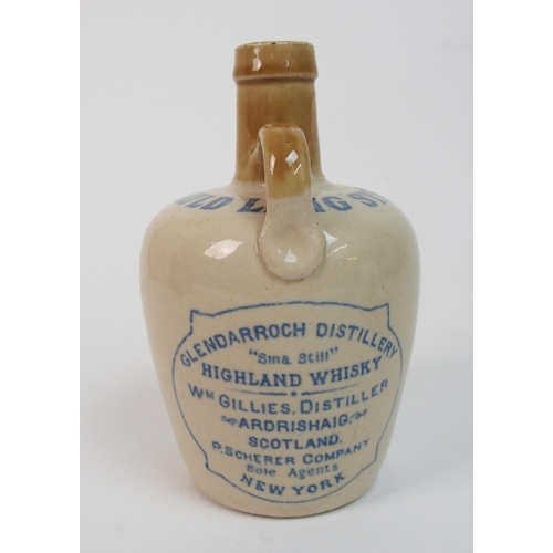 558 - A Cochran and Fleming Britannia Pottery whisky jug