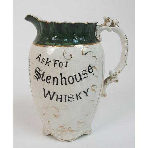 558 - A Cochran and Fleming Britannia Pottery whisky jug