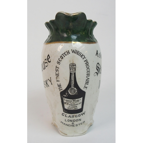 558 - A Cochran and Fleming Britannia Pottery whisky jug