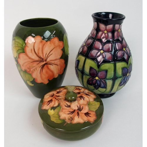 564 - A Moorcroft Violet pattern vase