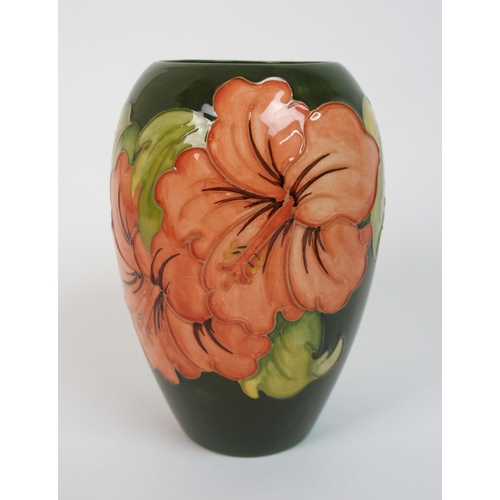 564 - A Moorcroft Violet pattern vase