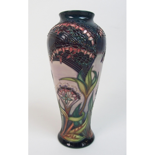 565 - A Moorcroft Collectors Club Fuchsia pattern vase