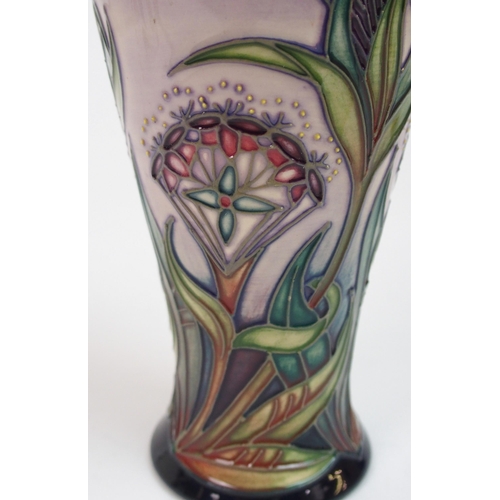 565 - A Moorcroft Collectors Club Fuchsia pattern vase