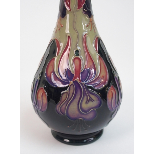 565 - A Moorcroft Collectors Club Fuchsia pattern vase