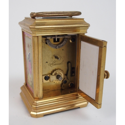 566 - A Miniature French carriage clock