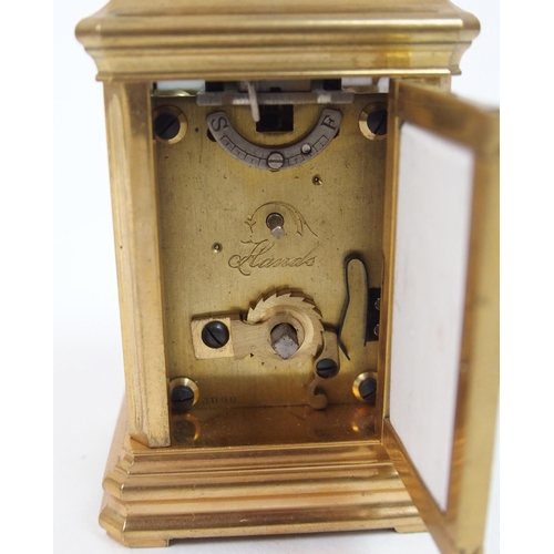 566 - A Miniature French carriage clock