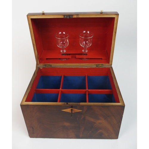 567 - A 19th century flame mahogany decanter box