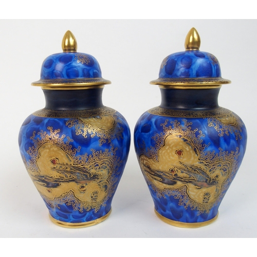 571 - A pair of Carlton Ware Paradise Bird and Tree pattern jars and covers