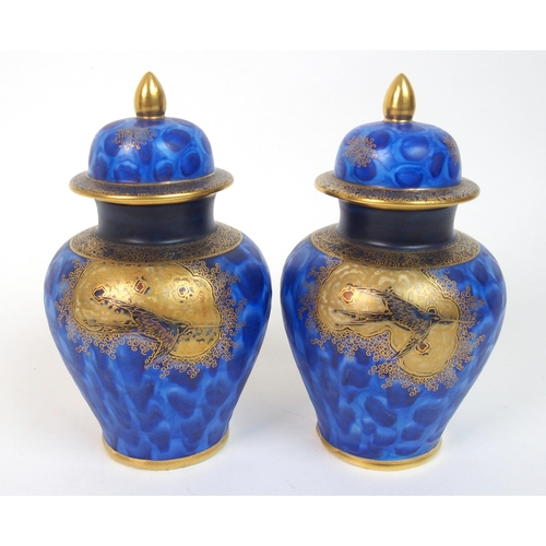 571 - A pair of Carlton Ware Paradise Bird and Tree pattern jars and covers