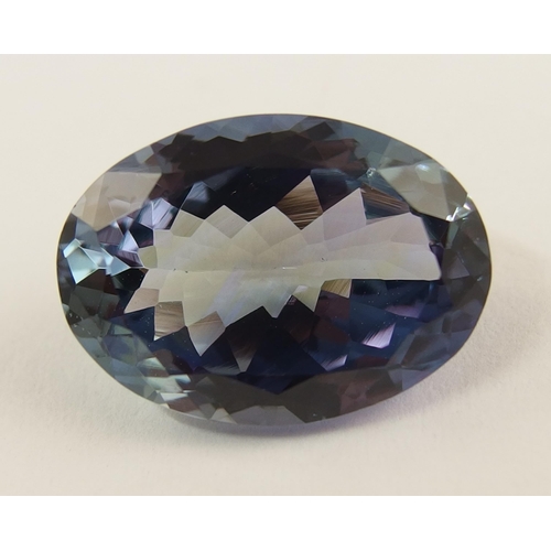 609 - A loose oval mixed cut tanzanite