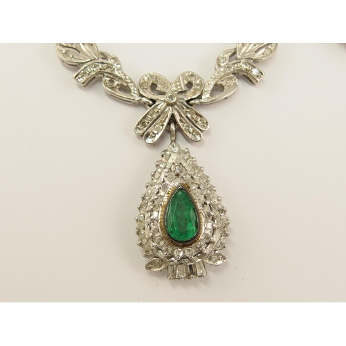 610 - An emerald and diamond suite