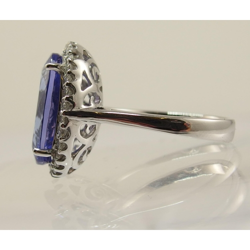 611 - An 18ct white gold tanzanite and diamond ring