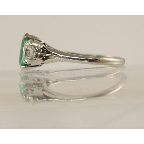 617 - A platinum emerald and diamond ring