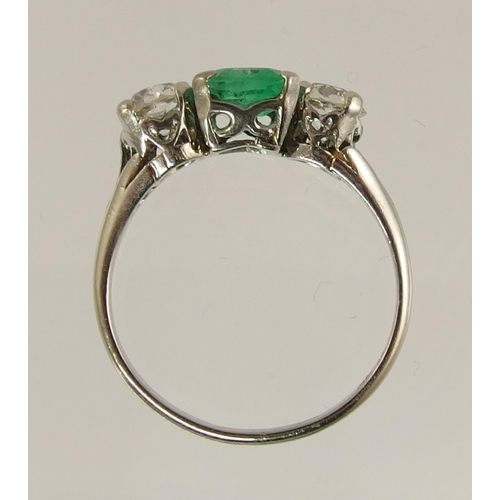 617 - A platinum emerald and diamond ring