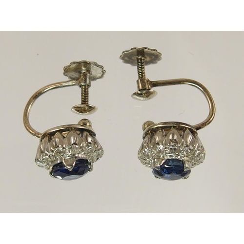 618 - A pair of 9ct yellow and white gold sapphire and diamond earrings