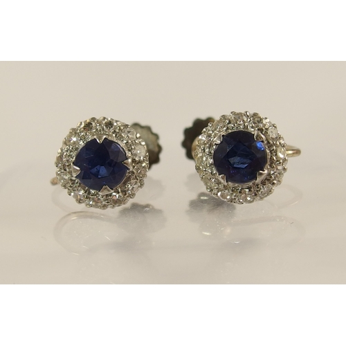 618 - A pair of 9ct yellow and white gold sapphire and diamond earrings