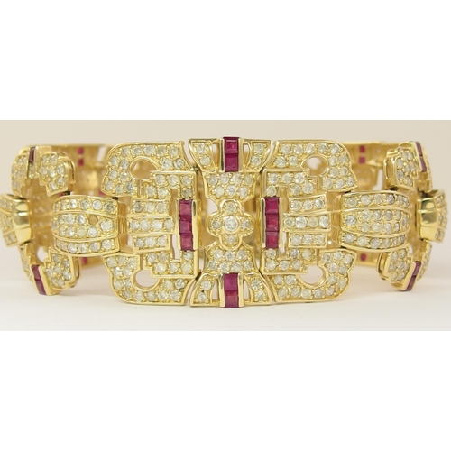 633 - A 14ct ruby and diamond bracelet of Art Deco style