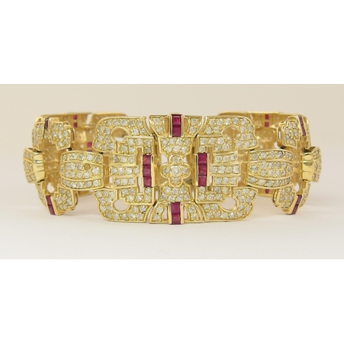 633 - A 14ct ruby and diamond bracelet of Art Deco style