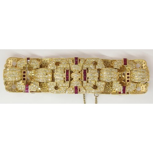 633 - A 14ct ruby and diamond bracelet of Art Deco style