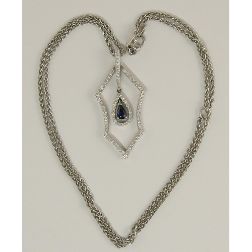 635 - An 18ct white gold sapphire and diamond necklace