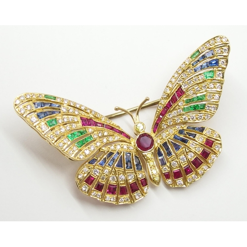 637 - An exquisite gemstone set butterfly brooch