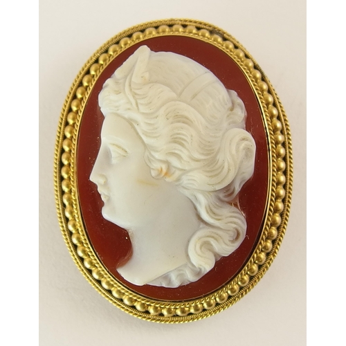 638 - A carved hardstone cameo of a maiden