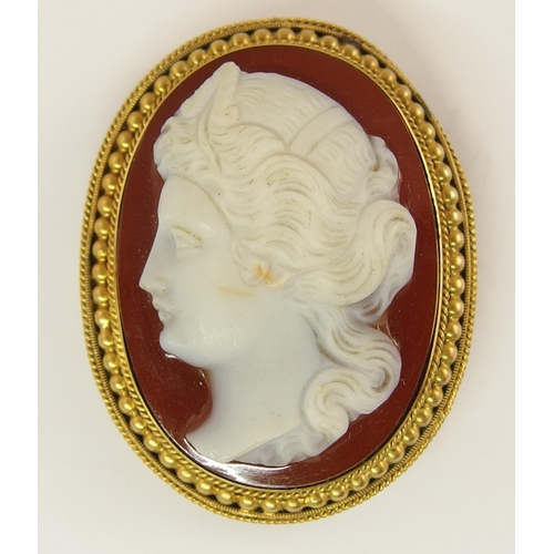 638 - A carved hardstone cameo of a maiden