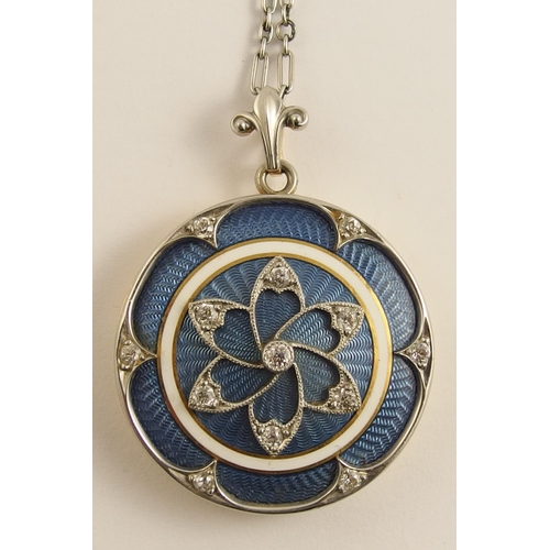 641 - A Belle Epoque style guilloche enamel and diamond locket