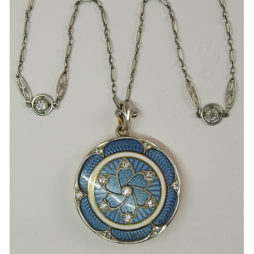 641 - A Belle Epoque style guilloche enamel and diamond locket