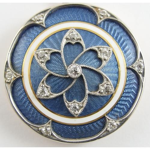 641 - A Belle Epoque style guilloche enamel and diamond locket