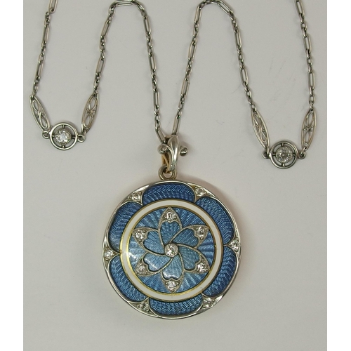 641 - A Belle Epoque style guilloche enamel and diamond locket