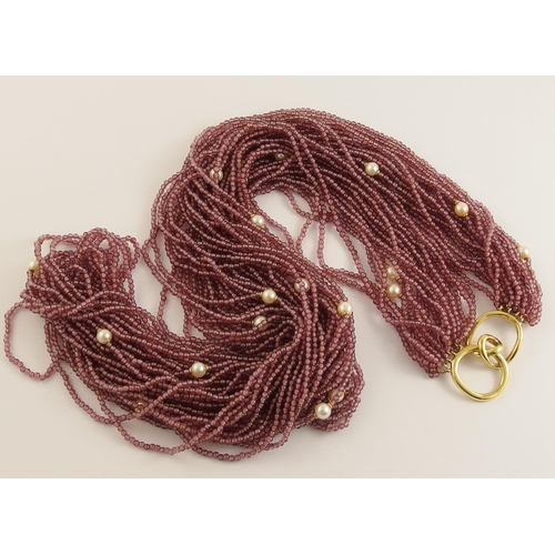 642 - A garnet and pearl festoon necklace with a 14ct gold clasp